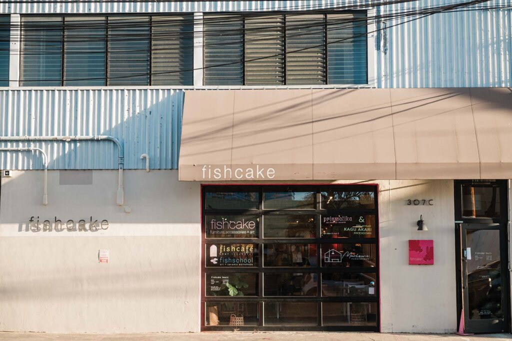 a building with a fish cake shop